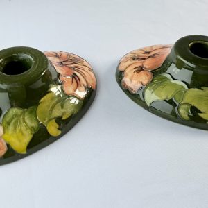 Moorcroft candle holder, Coral Hibiscus pattern, olive green with orange-pink flowers, 1968-1978